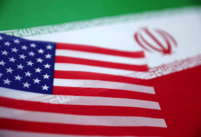 U.S. and Iran flags are seen in this illustration taken June 18, 2025. | Reuters